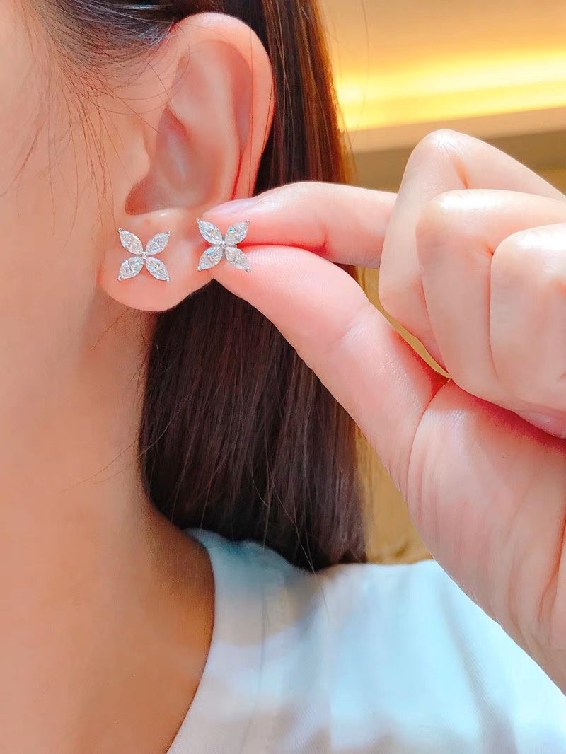 T*f*ny earrings